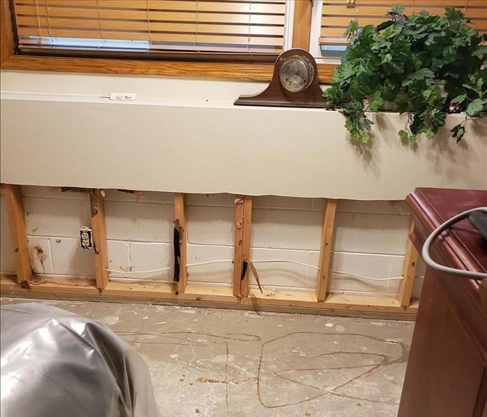 broken pipe leads to water damage, flooring and drywall removal